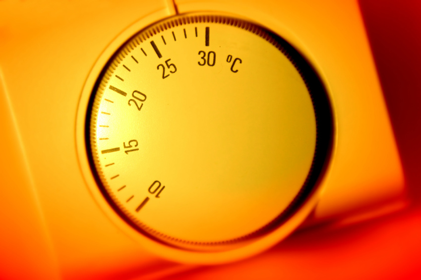 Thermostat A thermostat is shown surrounded by a warm orange glow