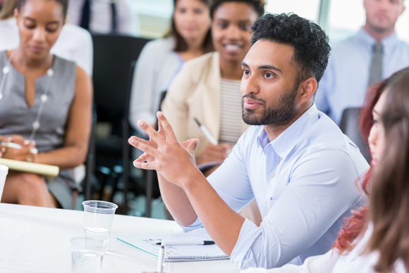 A panel of people having a discussion