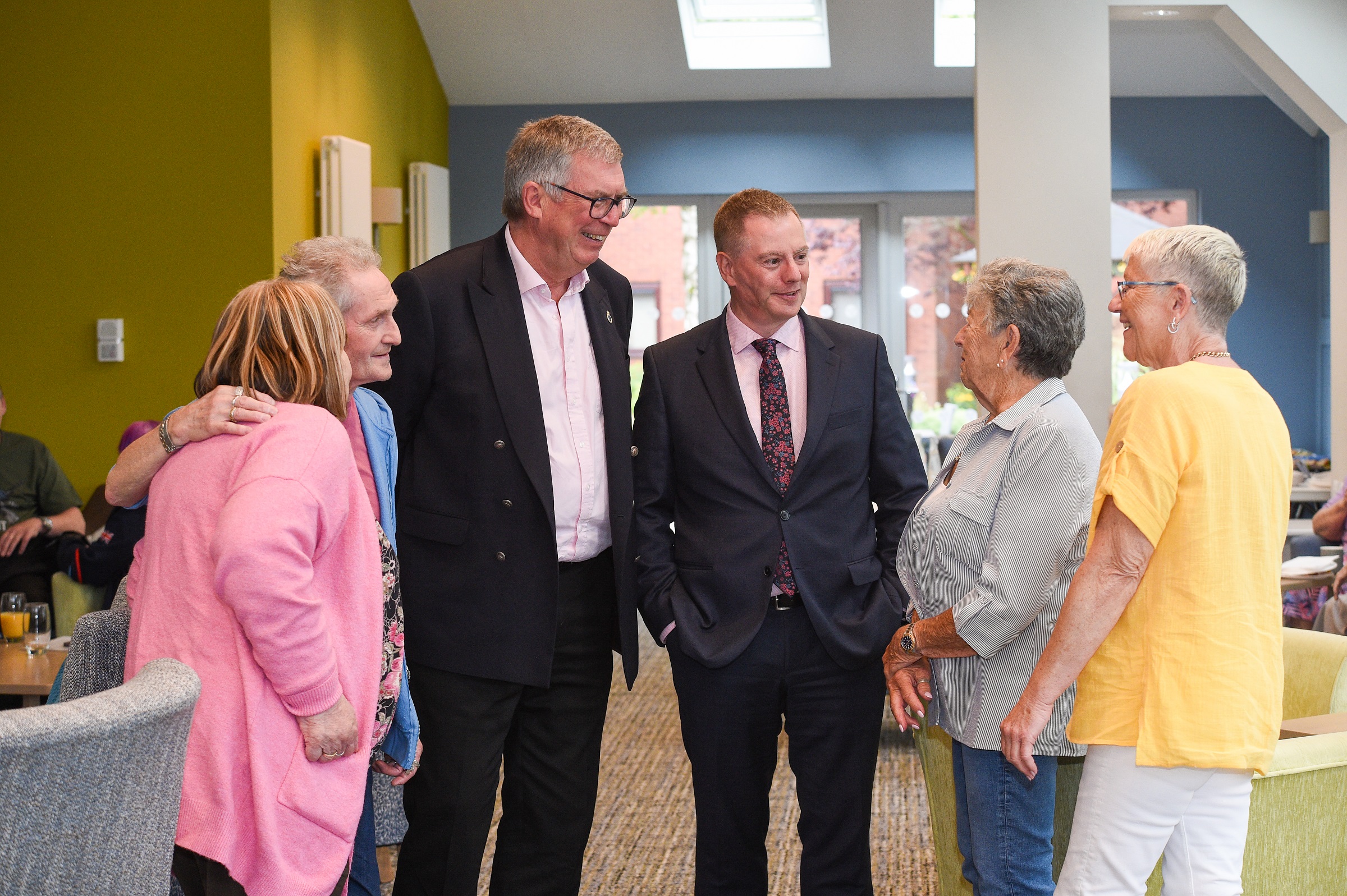 Andrew Manning-Cox and Craig Moule chatting with JJH residents