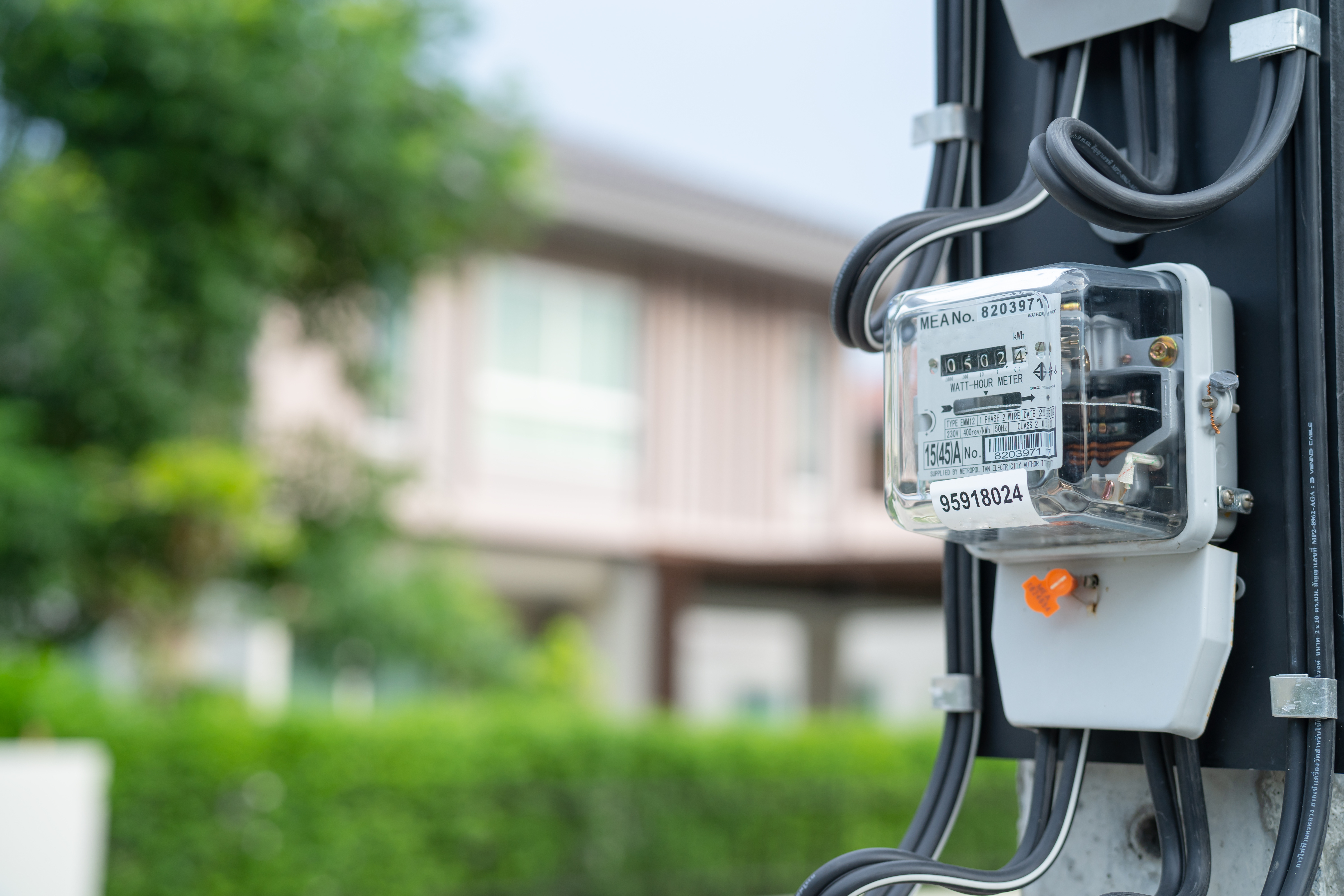 A meter with housing in the background