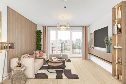 A light beige modern sitting room accented with white, a cream coloured sofa sits opposite a wall mounted television and to its left is large glass doors leading to a balcony