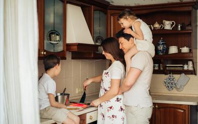Young family cooking together at Sanctuary