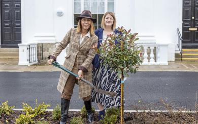 Helen Grant MP and Lizzie Hieron planting a small tree