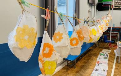 Handmade lanterns hang in a row