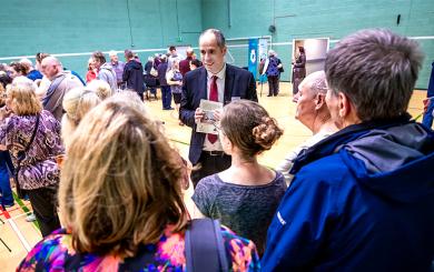 Members of the public gathering in an indoor hall to hear about Sanctuary's Laindon development plan