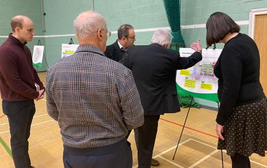 Sanctuary representatives gathered around display boards showing the Laindon regeneration plans