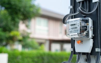 A meter with housing in the background