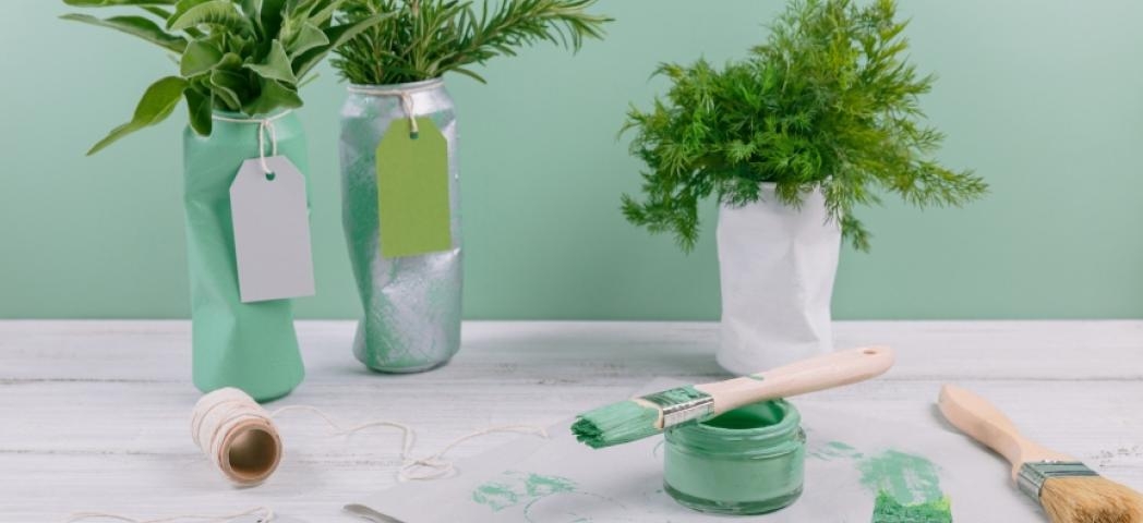 DIY plant pots, green paint and a used paint brush