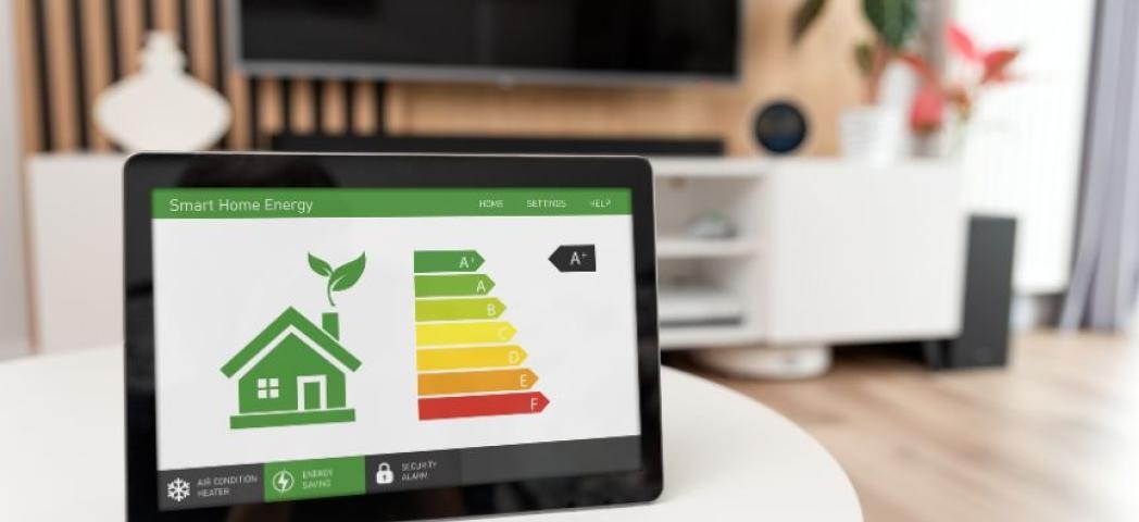A tablet screen on a table in a modern new build home showing an EPC report 