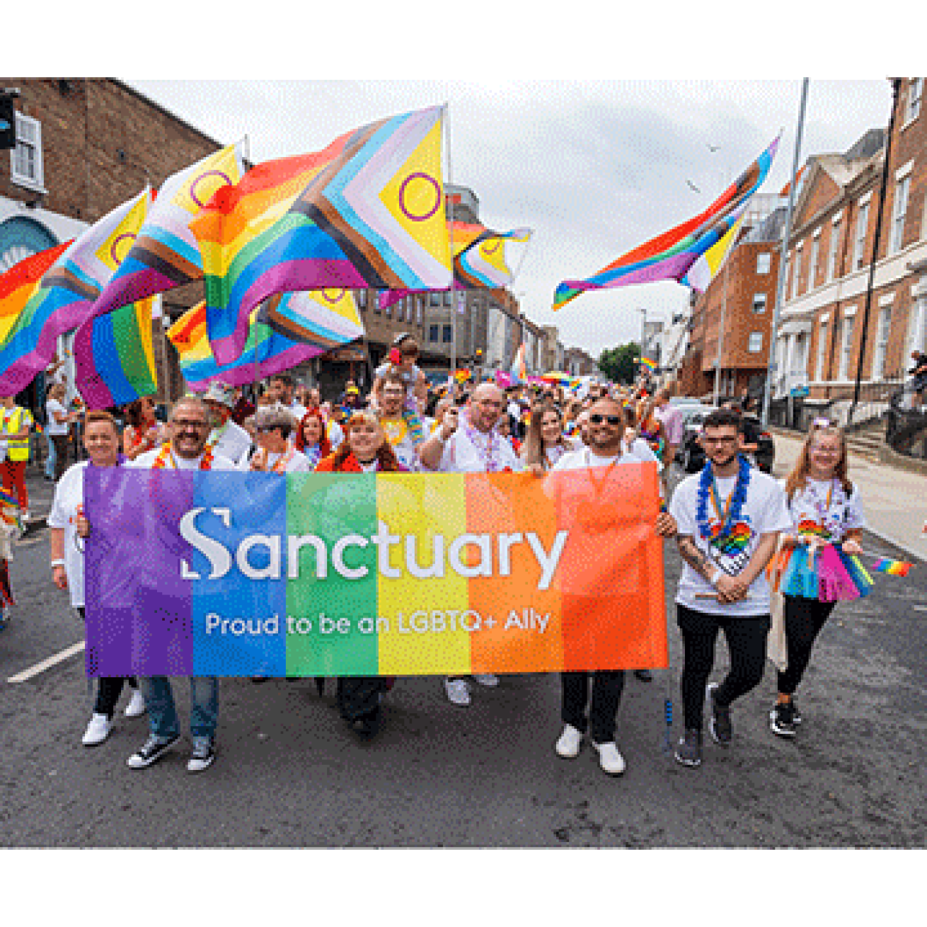 Sanctuary staff, friends and family join the  procession for Hull pride