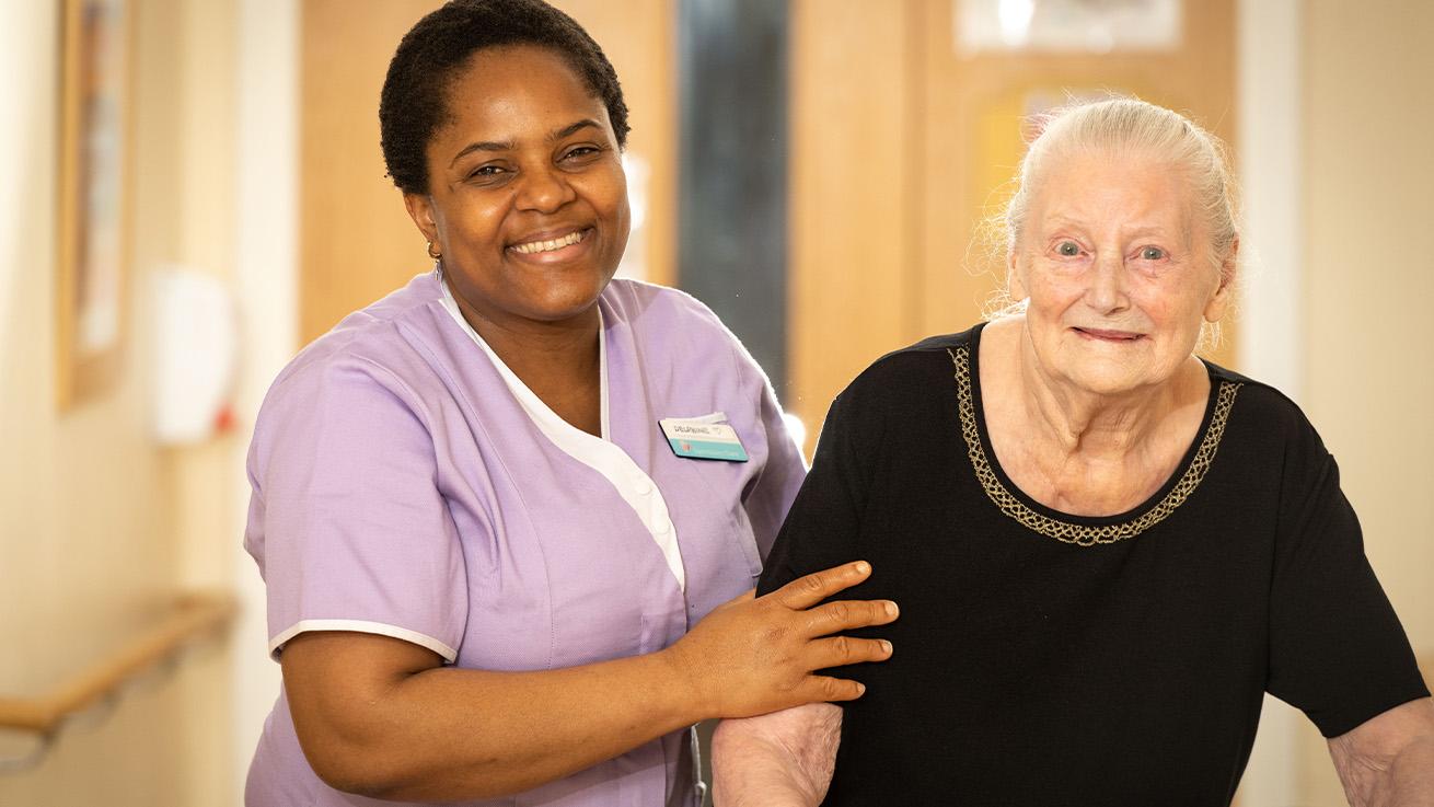 Care assistant with resident Care assistant with resident