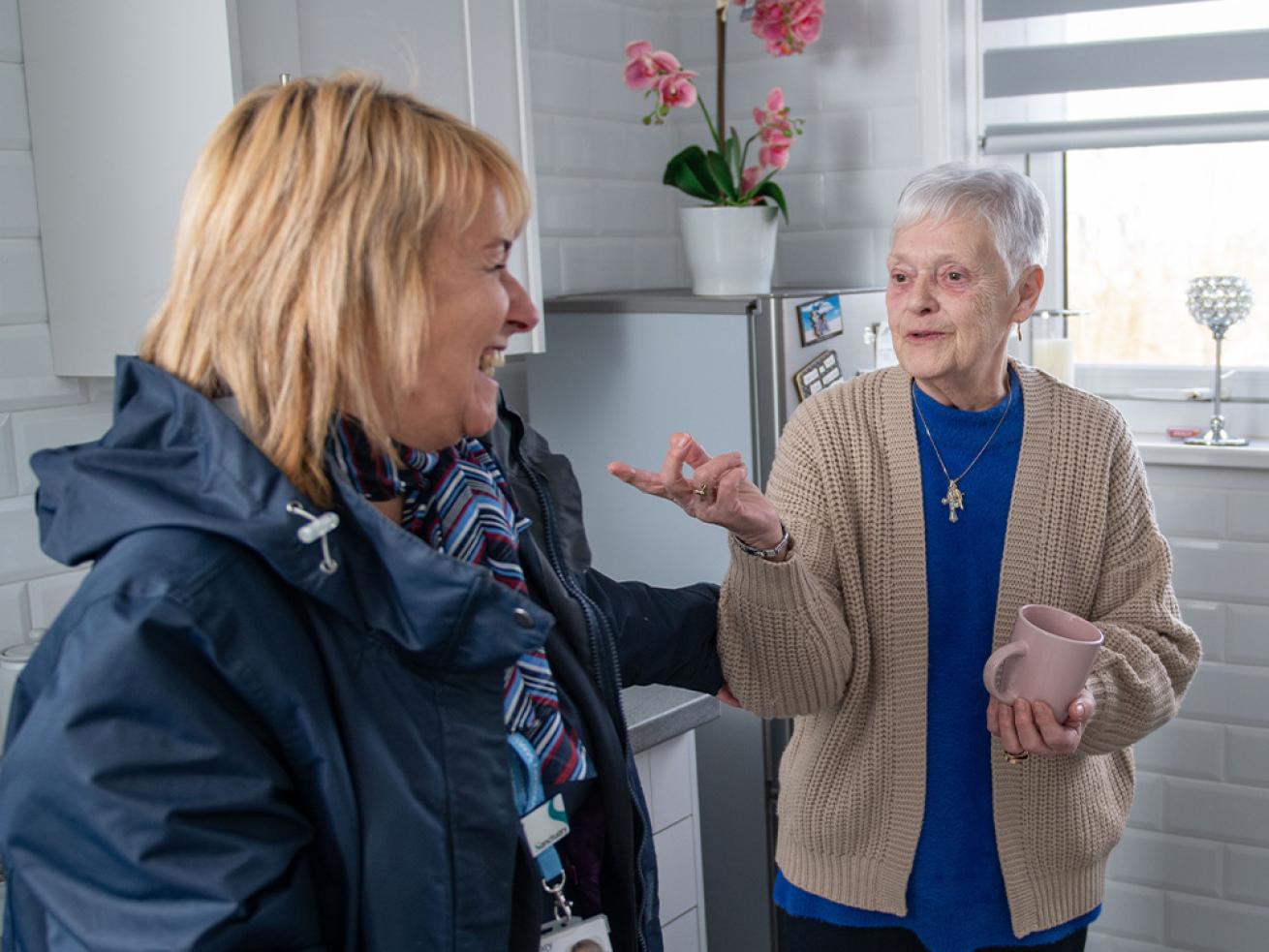 Resident and housing officer talking Resident and housing officer talking