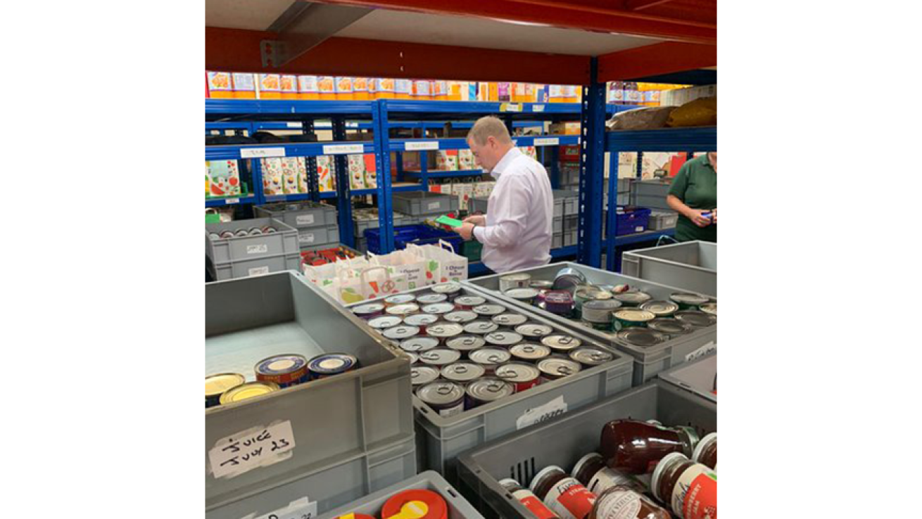 Craig Moule volunteering at a Fare Share facility