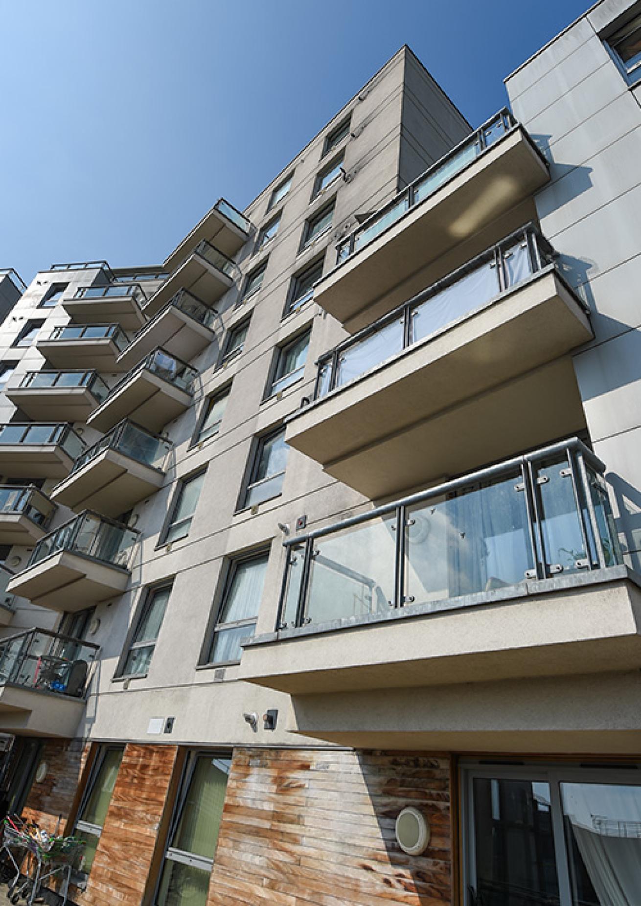 Exterior image of the high-rise apartments of Holly Court.