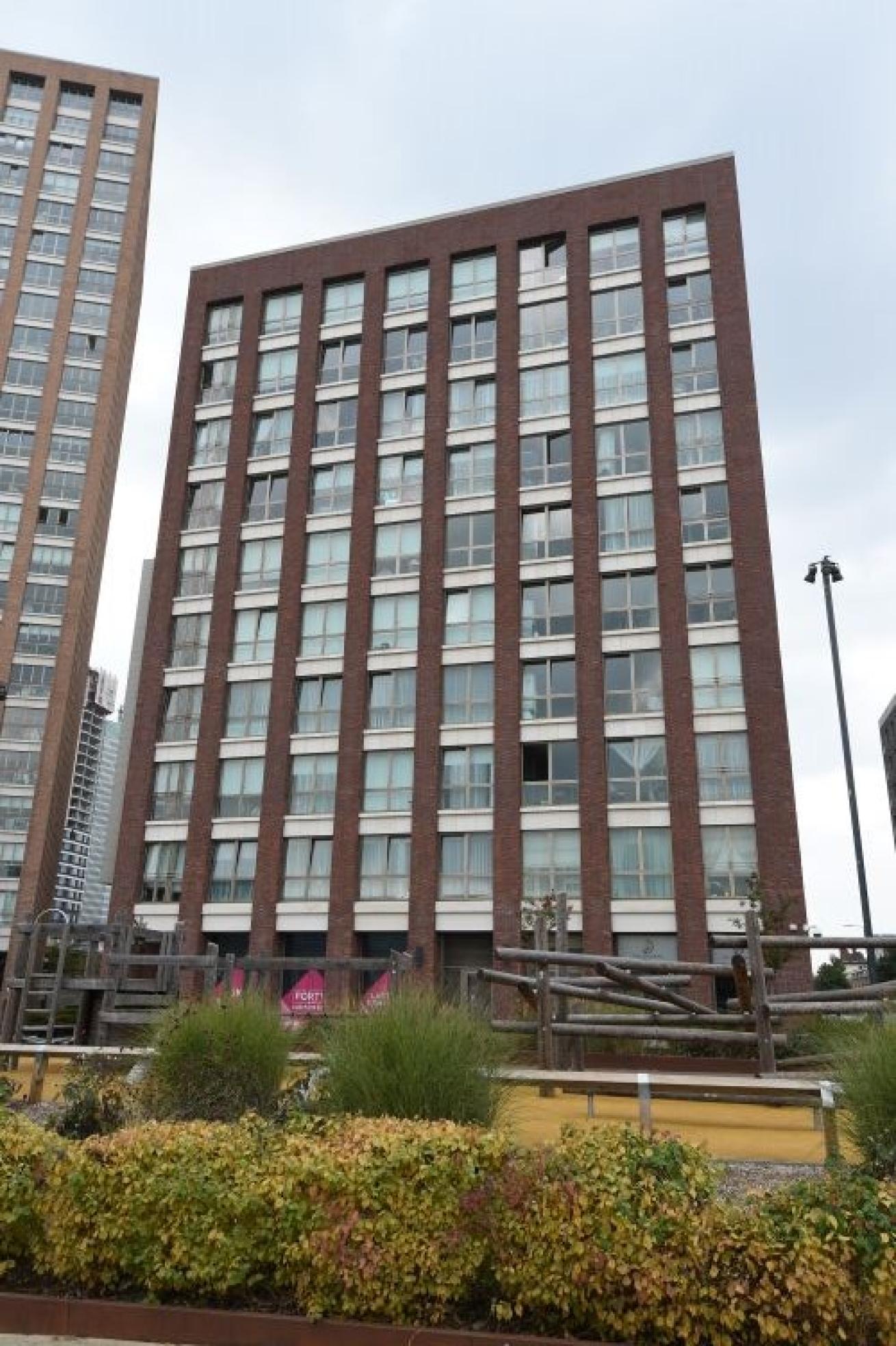 Exterior image of the high-rise apartment building Elligood Court in London