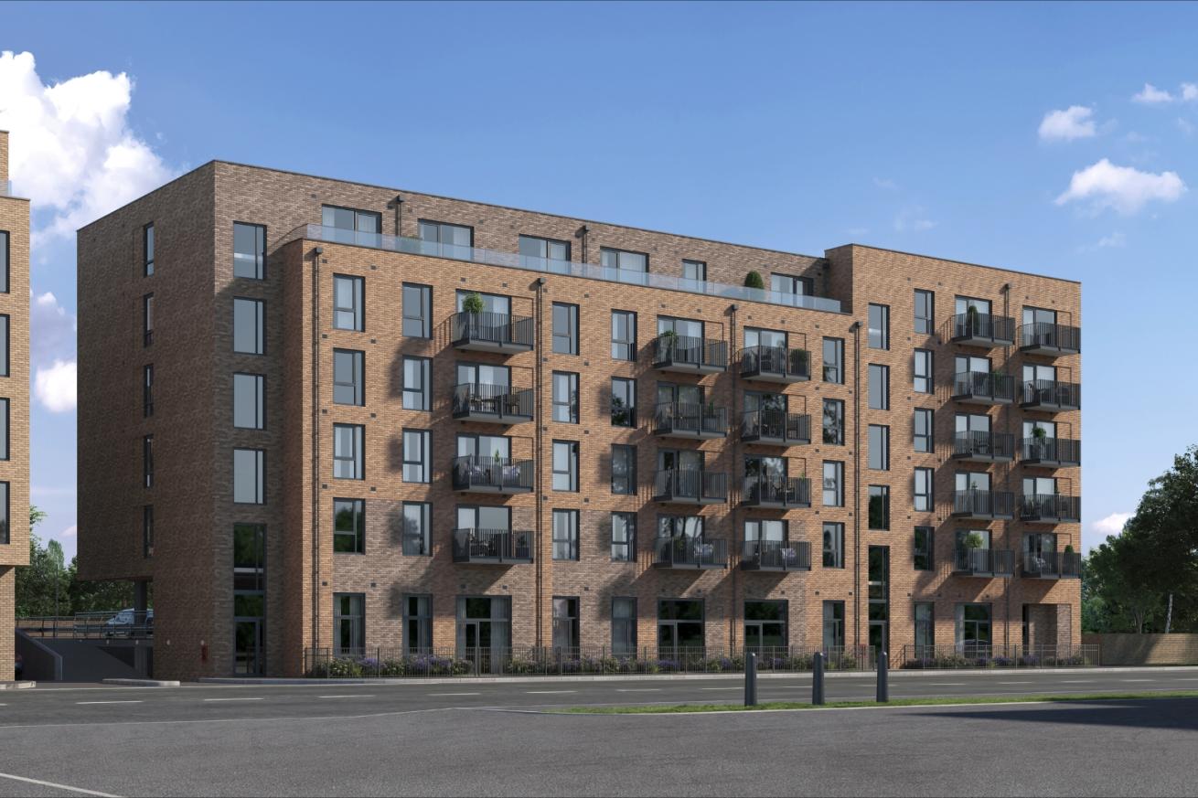 A large purpose built apartment building with balconies 