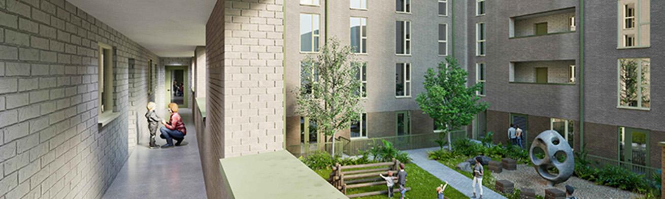 Modern apartment courtyard with landscaped gardens, seating and play area, viewed from open-access balconies.