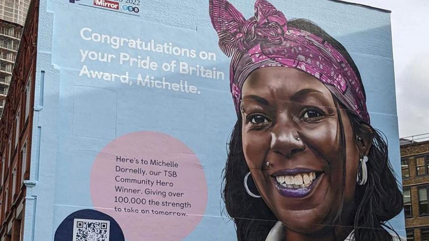 Children with Voices founder Michelle Dornelly is featured in a giant mural on Old Street. 