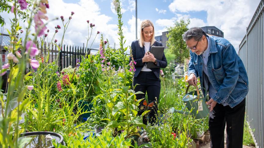 Housing Officer Janine Pulling with resident Rana Jude at Anderston allotments