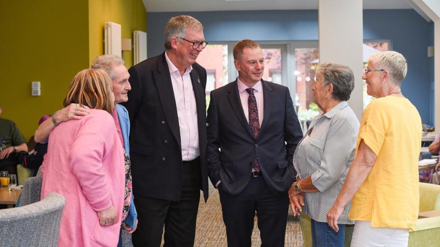 Andrew Manning-Cox and Craig Moule chatting with JJH residents