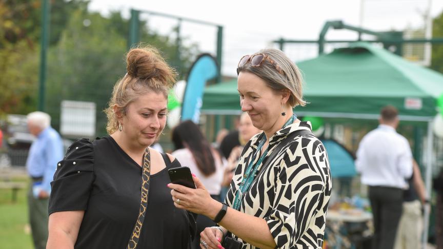 Housing Officer Sarah Strawson talks to a resident at a Customer Focus day in Ely, Cambridge