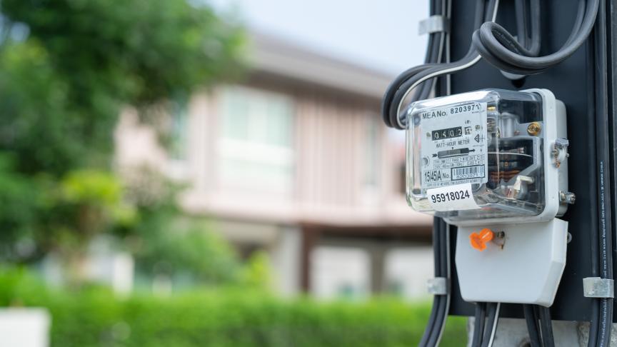 A meter with housing in the background