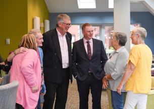Andrew Manning-Cox and Craig Moule chatting with JJH residents