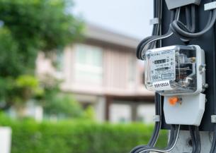 A meter with housing in the background